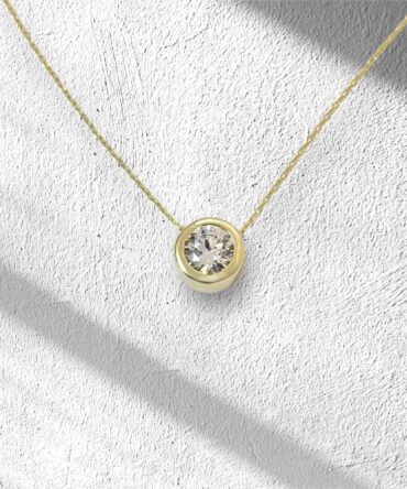 Χρυσό μενταγιόν μονοπετράκι σε στρογγυλό σχήμα με πέτρα ζιργκόν , κ14