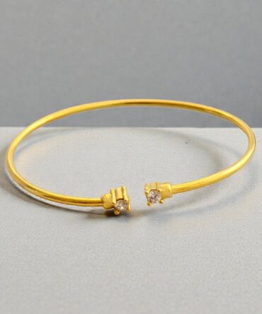 Επιχρυσωμένη γυναικεία χειροπέδα με πέτρες ζιργκόν από ασήμι 925