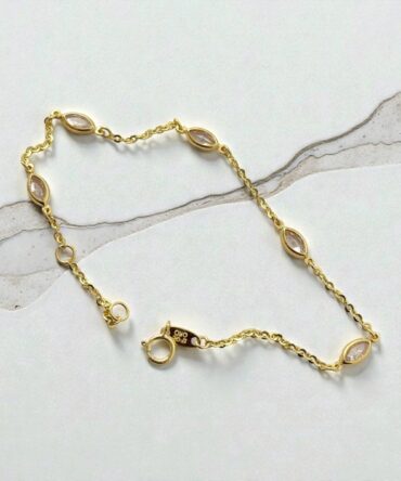 Χρυσό γυναικείο βραχιόλι με λευκές πέτρες ζιργκόν σε σχήμα δάκρυ , κ9