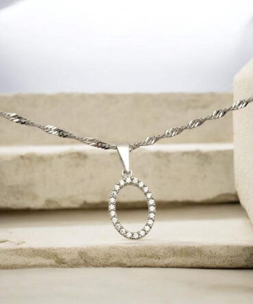 Λευκόχρυσο μενταγιόν σε οβάλ σχήμα με πέτρες ζιργκόν, κ14