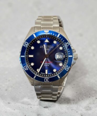 Ανδρικό ρολόι Roamer με ασημί ατσάλινο μπρασελέ και μπλε καντράν με βιδωτή κορώνα